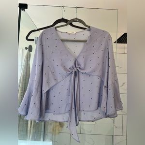 Blue blouse with wide sleeves and black dot accents - tie up Front